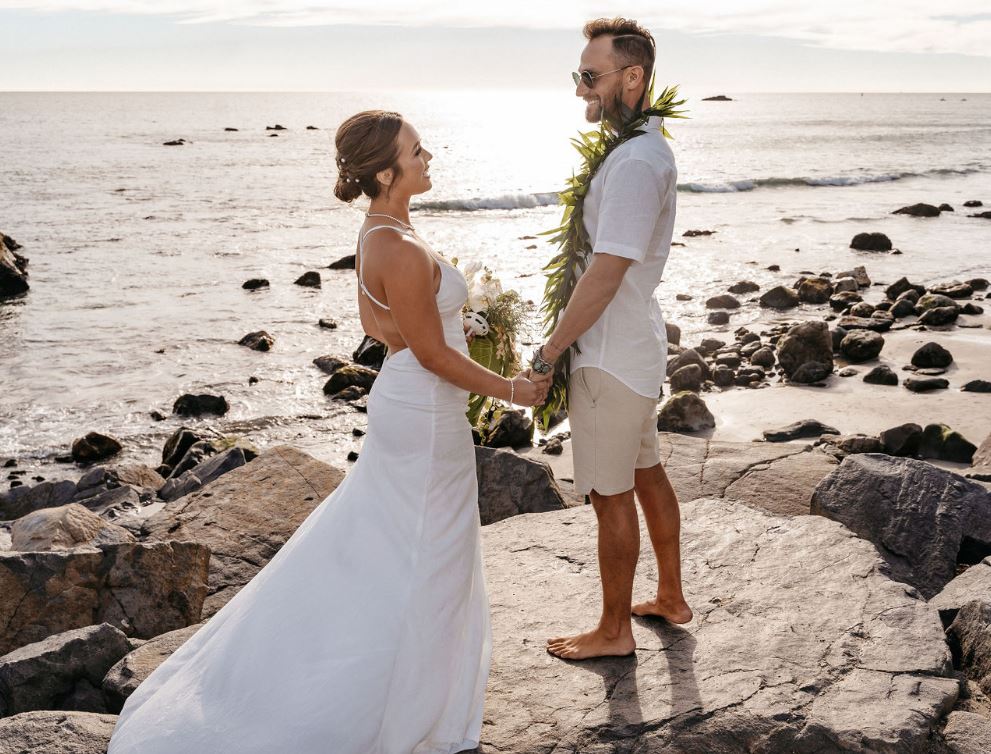 beach wedding with a natural sea background